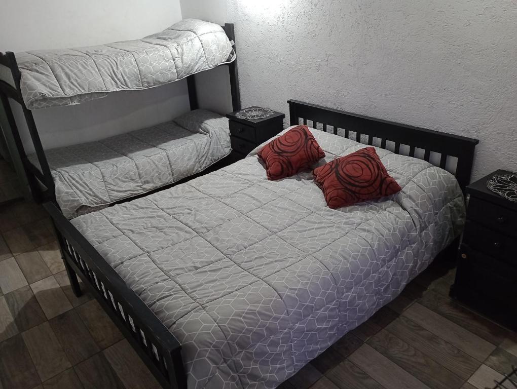 Postel nebo postele na pokoji v ubytování Primer esfuerzo