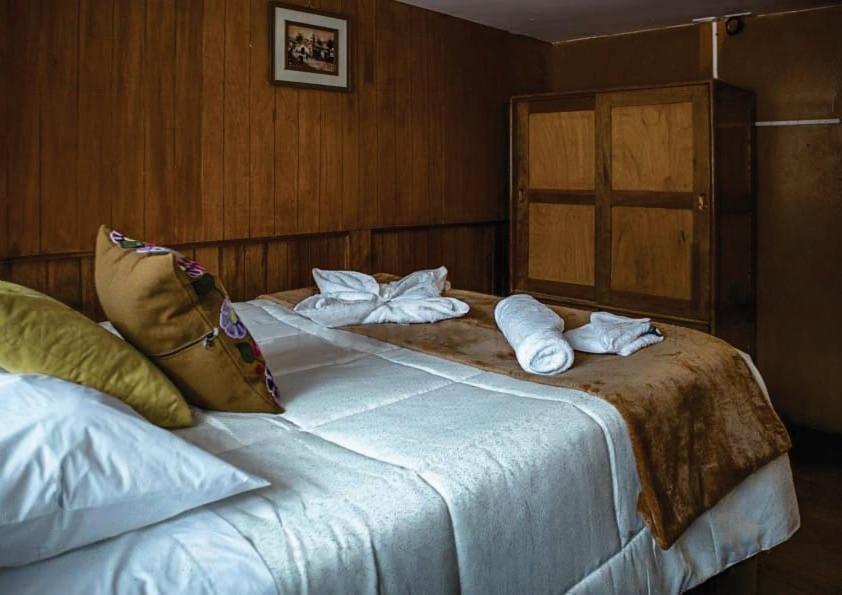Postel nebo postele na pokoji v ubytování WARM AND CENTRAL HOUSE WITH SPECTACULAR VIEW OF CUSCO