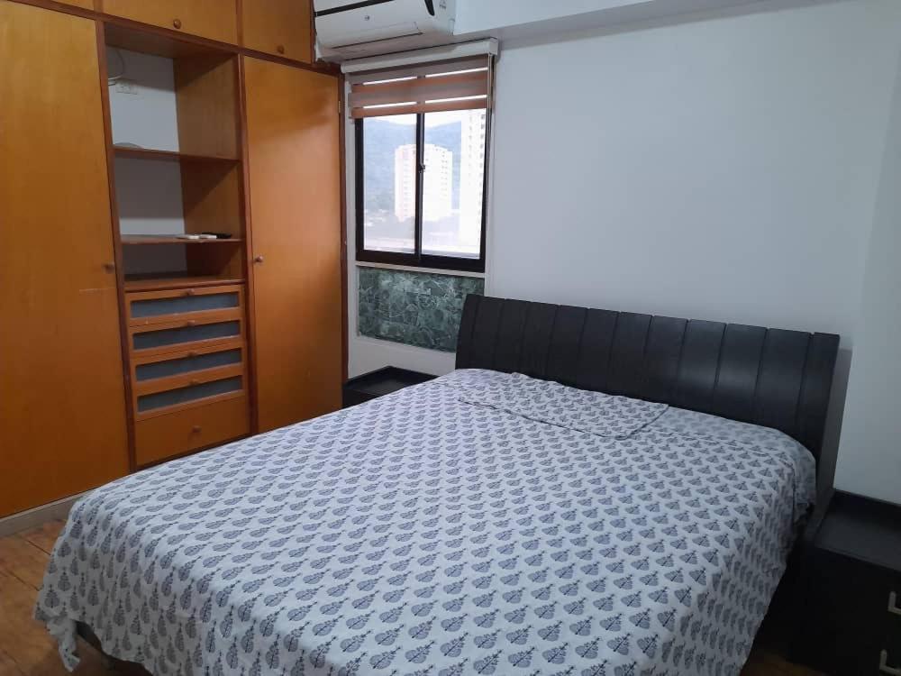 Rúm í herbergi á Apartamento En Valencia