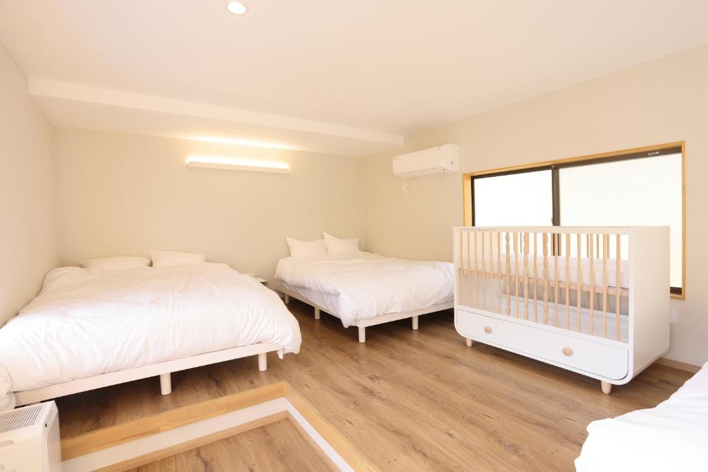 Postel nebo postele na pokoji v ubytování 4S resort eeyan