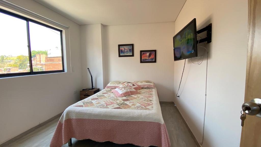 Postel nebo postele na pokoji v ubytování Apartamento Centro Marinilla