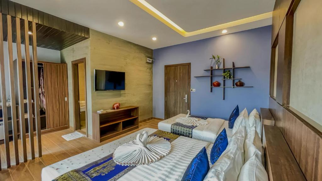 TV a/nebo společenská místnost v ubytování The Luxury
