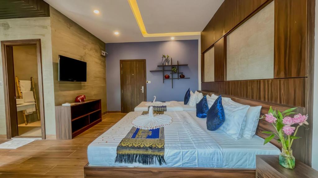 TV a/nebo společenská místnost v ubytování The Luxury