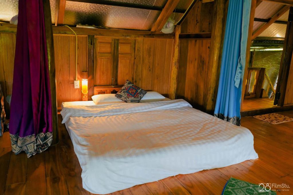 Postel nebo postele na pokoji v ubytování Pù Luông Happy Home