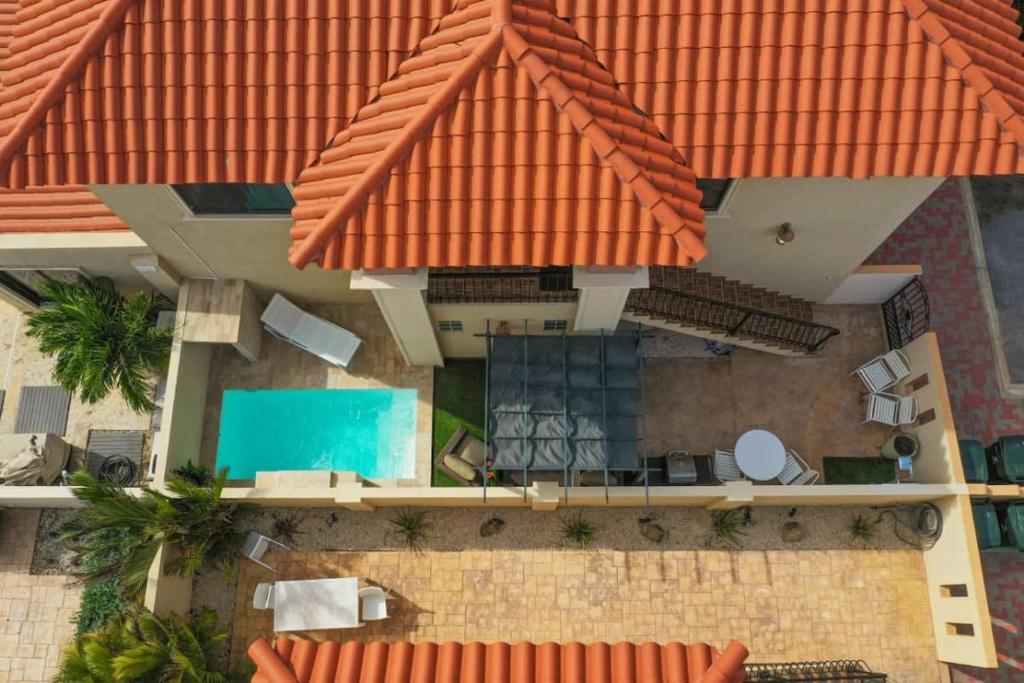 an overhead view of a house with a swimming pool at wonder apartment in gold coast with private pool in Palm-Eagle Beach