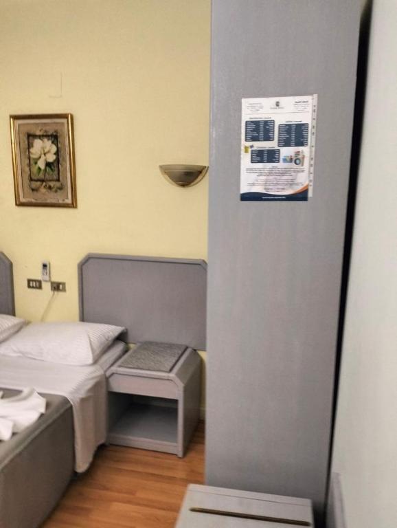 Postel nebo postele na pokoji v ubytování Emilio Hotel