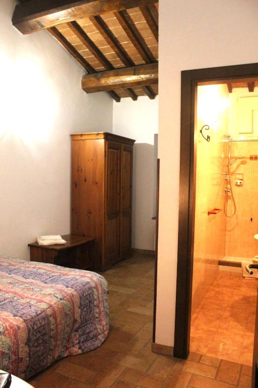 Letto o letti in una camera di Biobagnolese Agriturismo