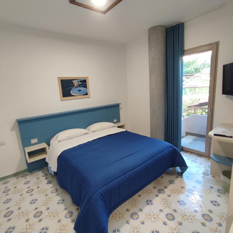 Postel nebo postele na pokoji v ubytování Il Barbacane