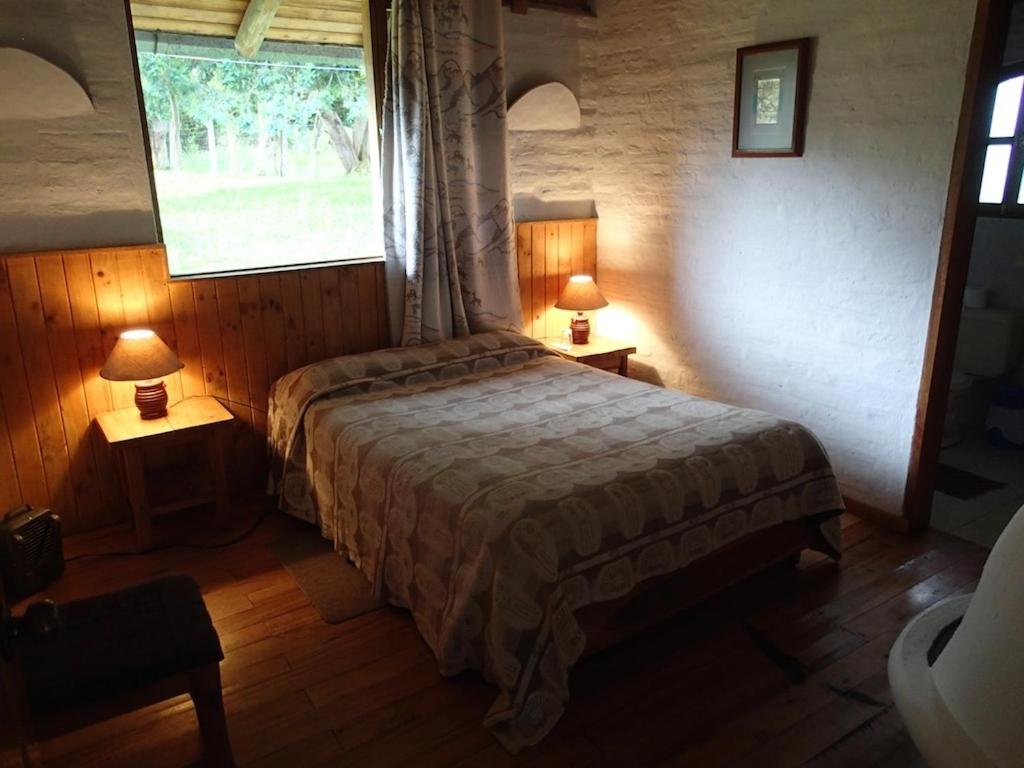 Postel nebo postele na pokoji v ubytování Hostería Hotel Cuello de Luna - Cotopaxi - Country Inn