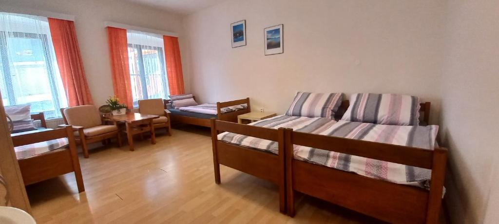Postel nebo postele na pokoji v ubytování Prázdninový dům Sloup - Sloup v Čechách