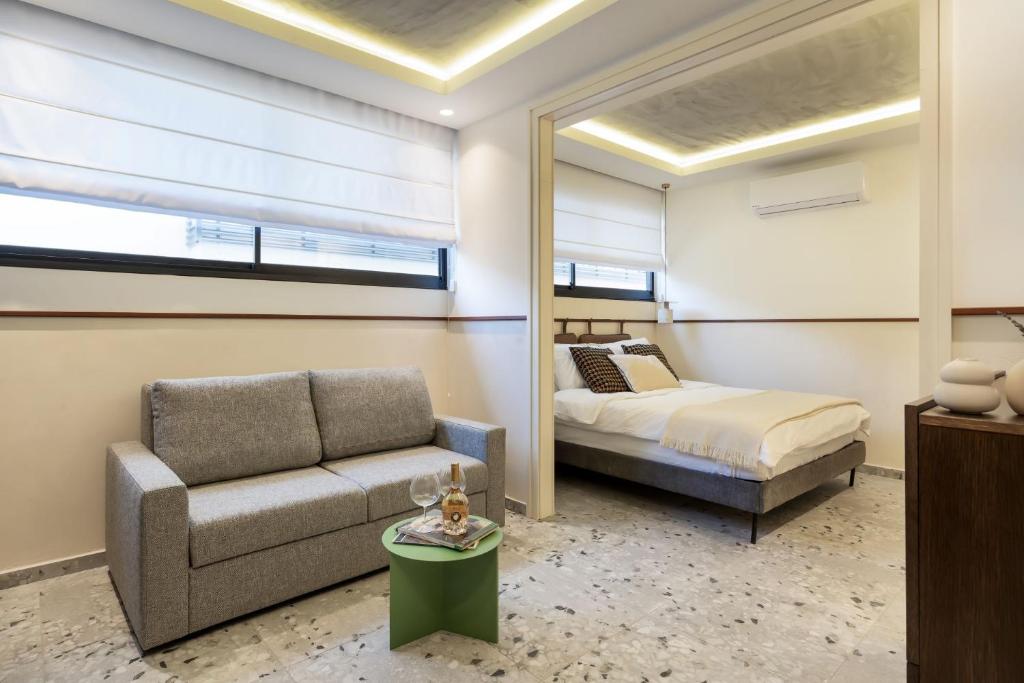 Postel nebo postele na pokoji v ubytování Mulan Hotel