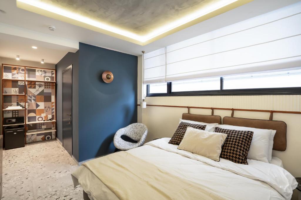 Postel nebo postele na pokoji v ubytování Mulan Hotel
