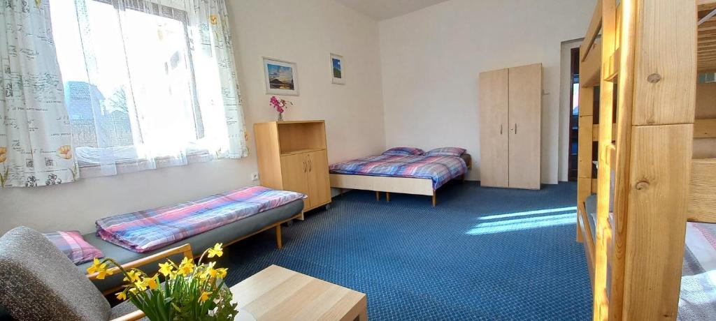 Postel nebo postele na pokoji v ubytování Prázdninový dům Sloup - Sloup v Čechách