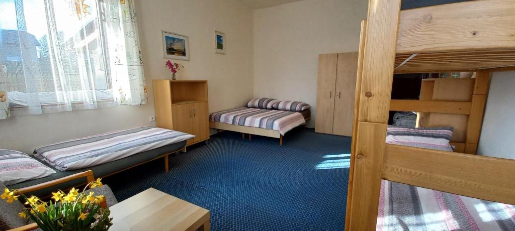 Postel nebo postele na pokoji v ubytování Prázdninový dům Sloup - Sloup v Čechách