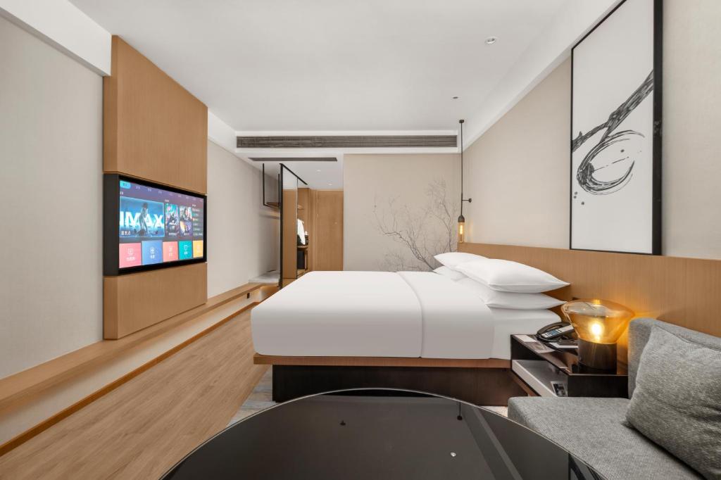 Fairfield by Marriott Changsha Yueluにあるテレビまたはエンターテインメントセンター