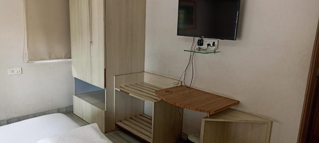 Μια τηλεόραση ή/και κέντρο ψυχαγωγίας στο Ballygunge Guest House