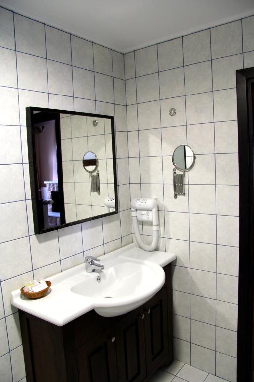Koupelna v ubytování Hotel Taxiarches