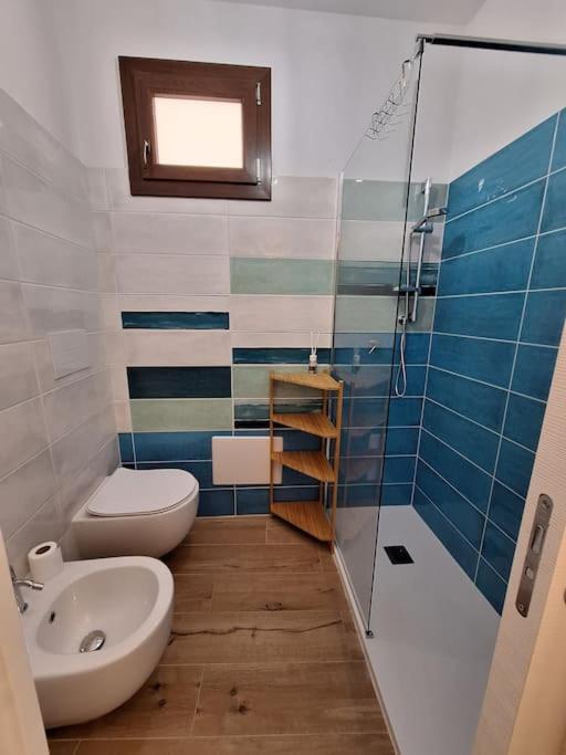 Koupelna v ubytování Dommu Amsicora