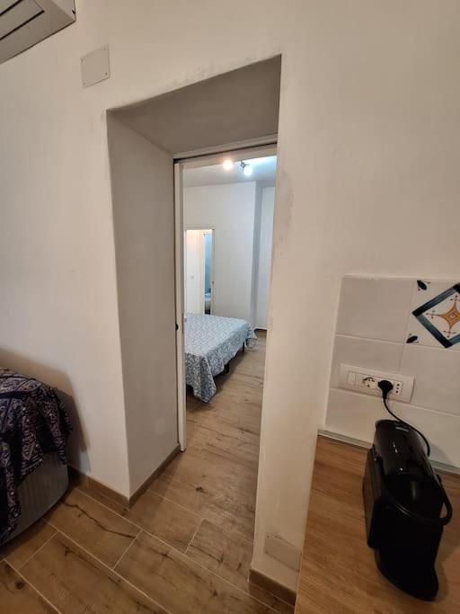 Postel nebo postele na pokoji v ubytování Dommu Amsicora