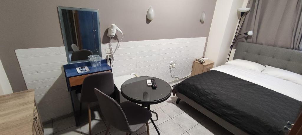 Postel nebo postele na pokoji v ubytování El Greco