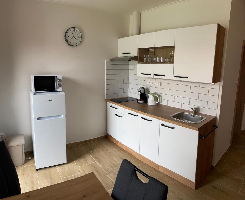 Kuchyň nebo kuchyňský kout v ubytování Apartmán Nezábudka