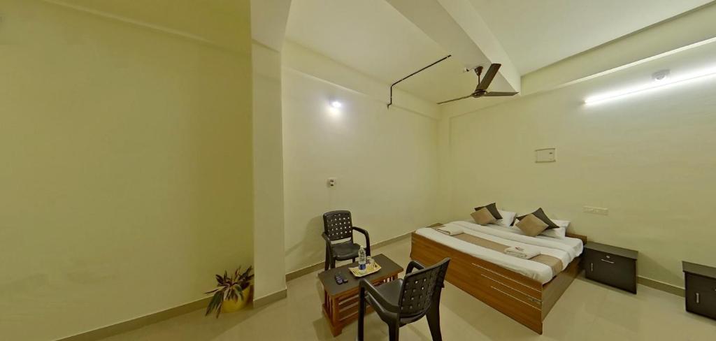 Letto o letti in una camera di Wayanad Royal Stream