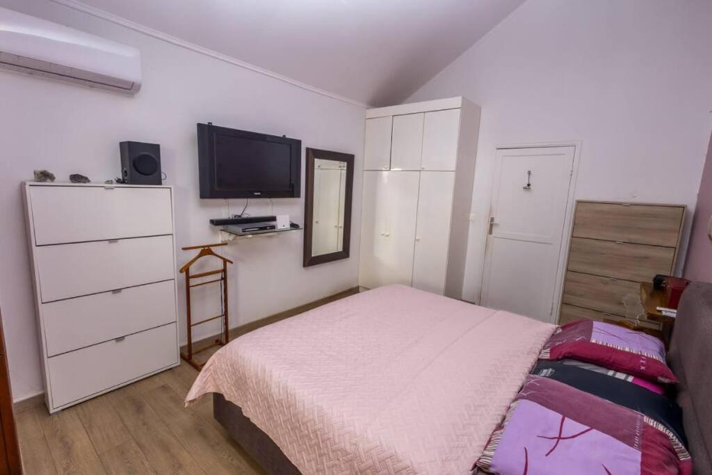 Postel nebo postele na pokoji v ubytování Villa Charm' Île