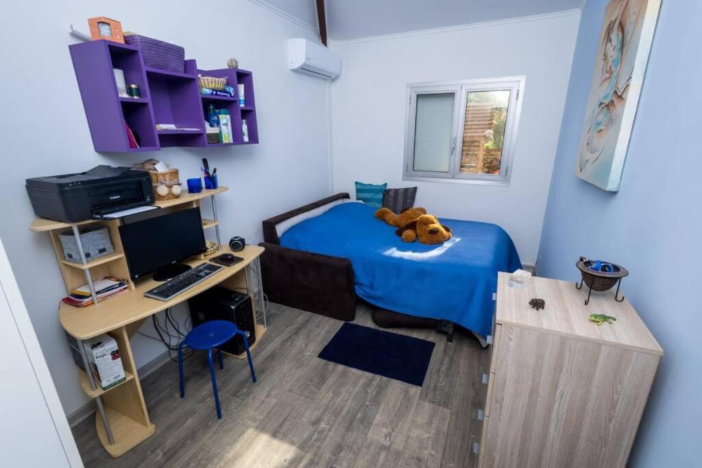 TV a/nebo společenská místnost v ubytování Villa Charm' Île