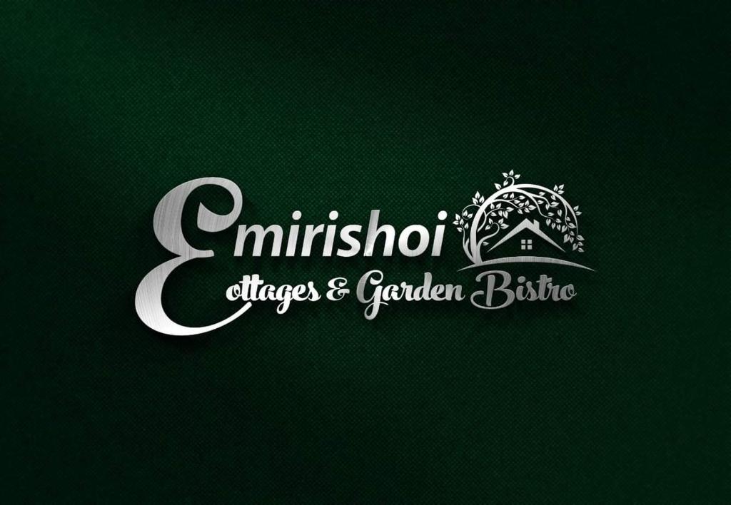 een wit logo voor een restaurant op een groene achtergrond bij Emirishoi Cottages and Garden Bistro in Narok