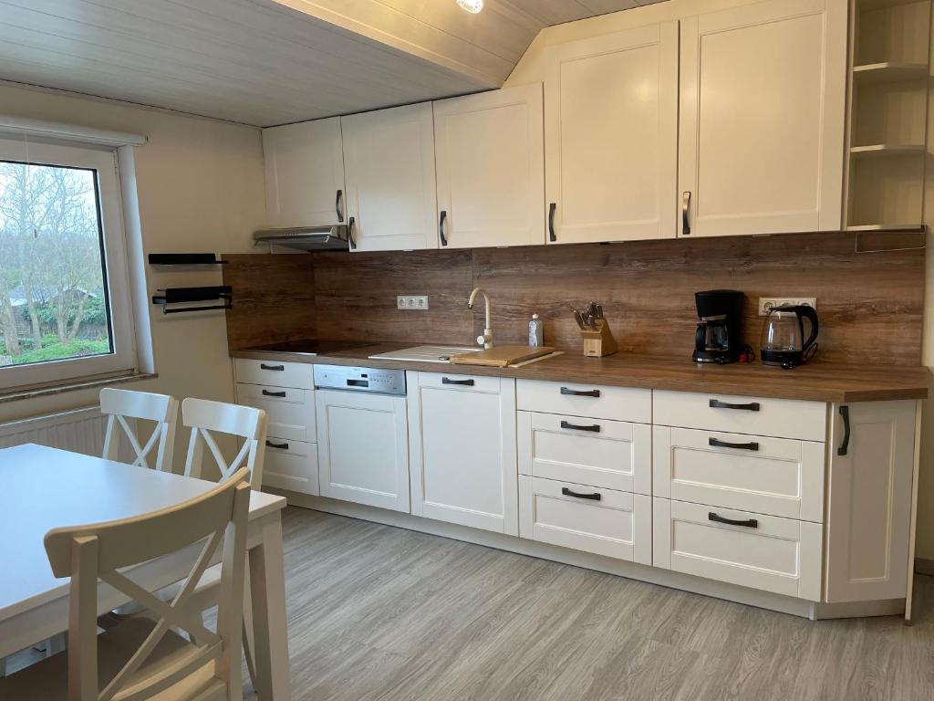 Kuchyň nebo kuchyňský kout v ubytování Ferienappartements Menssen