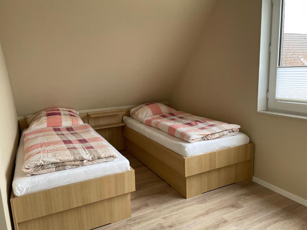 Postel nebo postele na pokoji v ubytování Ferienappartements Menssen