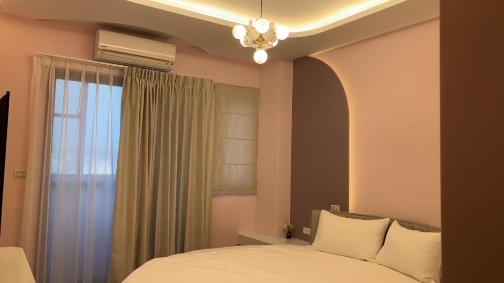 Postel nebo postele na pokoji v ubytování Mi Hai B&B