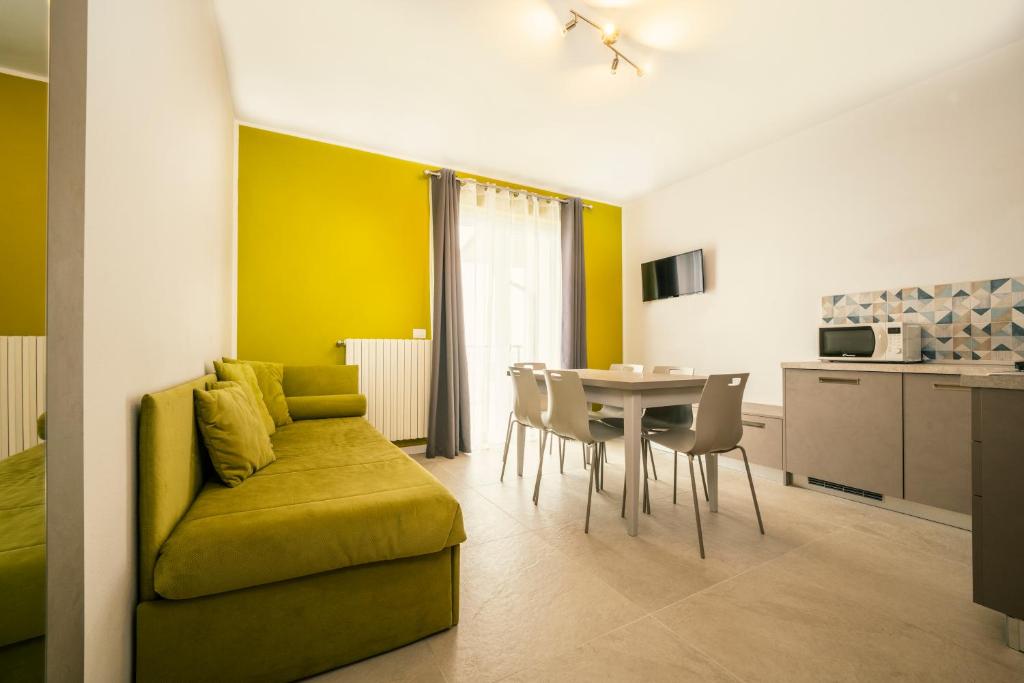 TV a/nebo společenská místnost v ubytování Hotel Residence La Rotonda