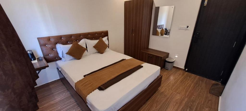 Postel nebo postele na pokoji v ubytování Meadows Inn