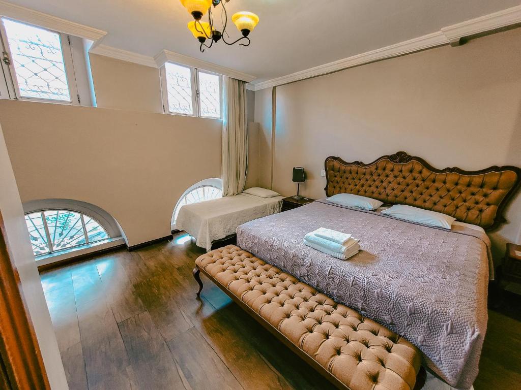 Ένα ή περισσότερα κρεβάτια σε δωμάτιο στο Seringal Hotel