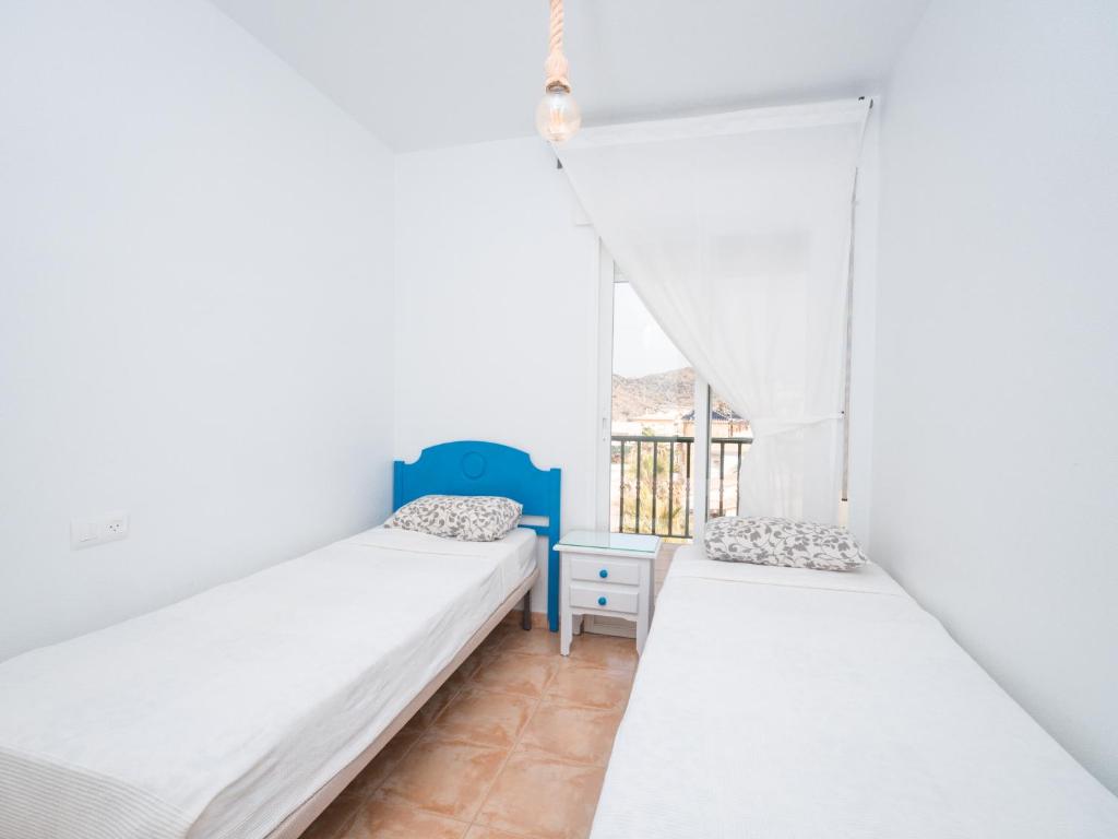 Posteľ alebo postele v izbe v ubytovaní Apartamentos El Calón Playa