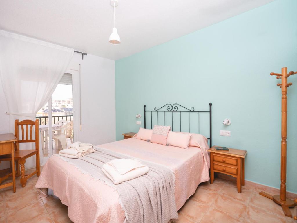 Posteľ alebo postele v izbe v ubytovaní Apartamentos El Calón Playa