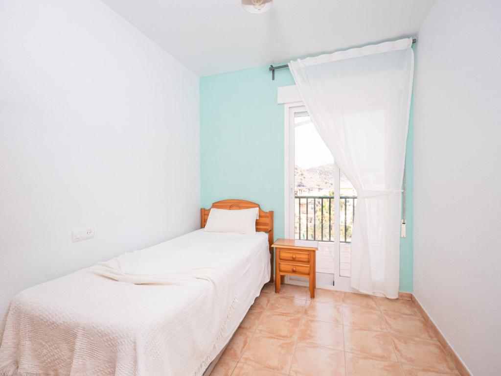 Posteľ alebo postele v izbe v ubytovaní Apartamentos El Calón Playa