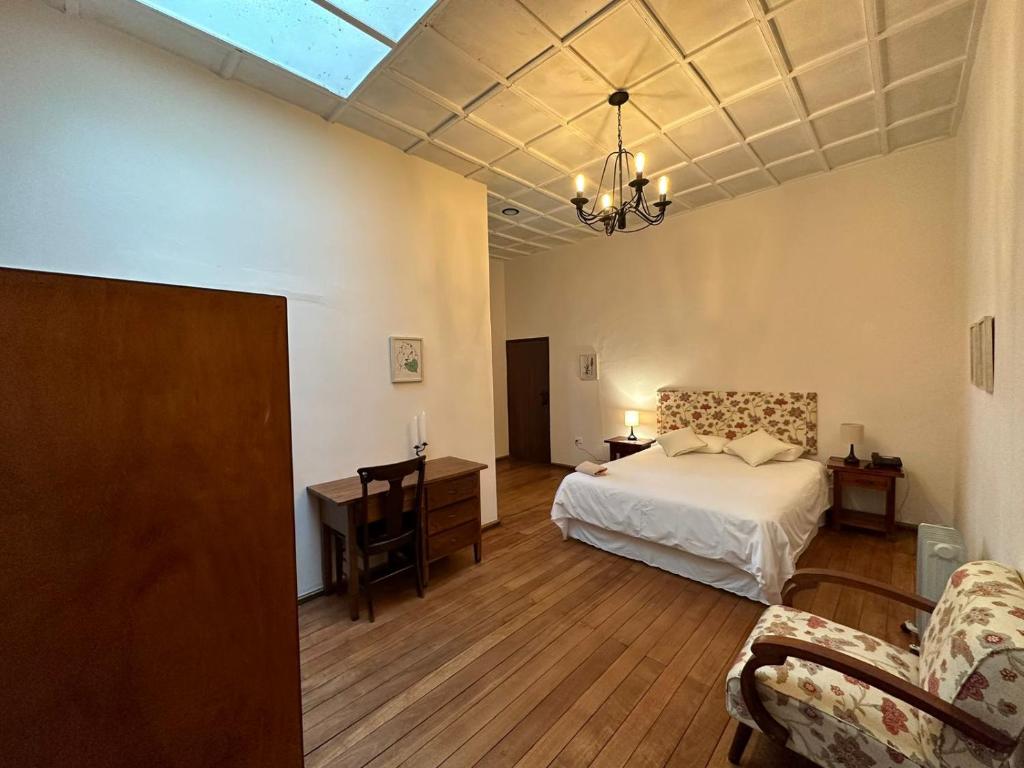 Postel nebo postele na pokoji v ubytování Hacienda La Cienega