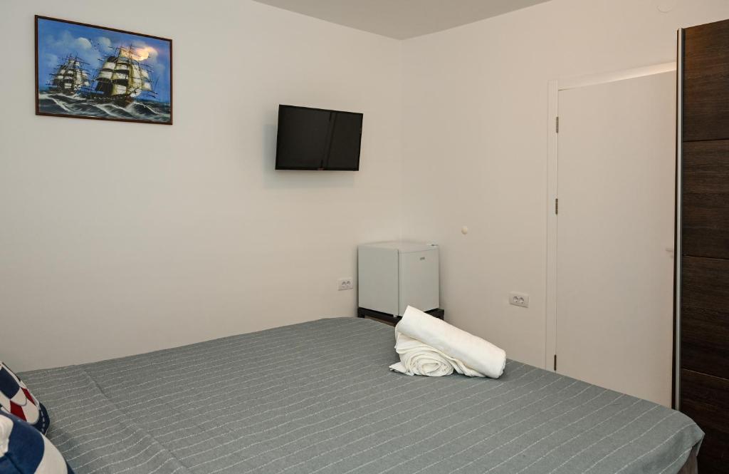 Postel nebo postele na pokoji v ubytování Porto Azzurro apartments