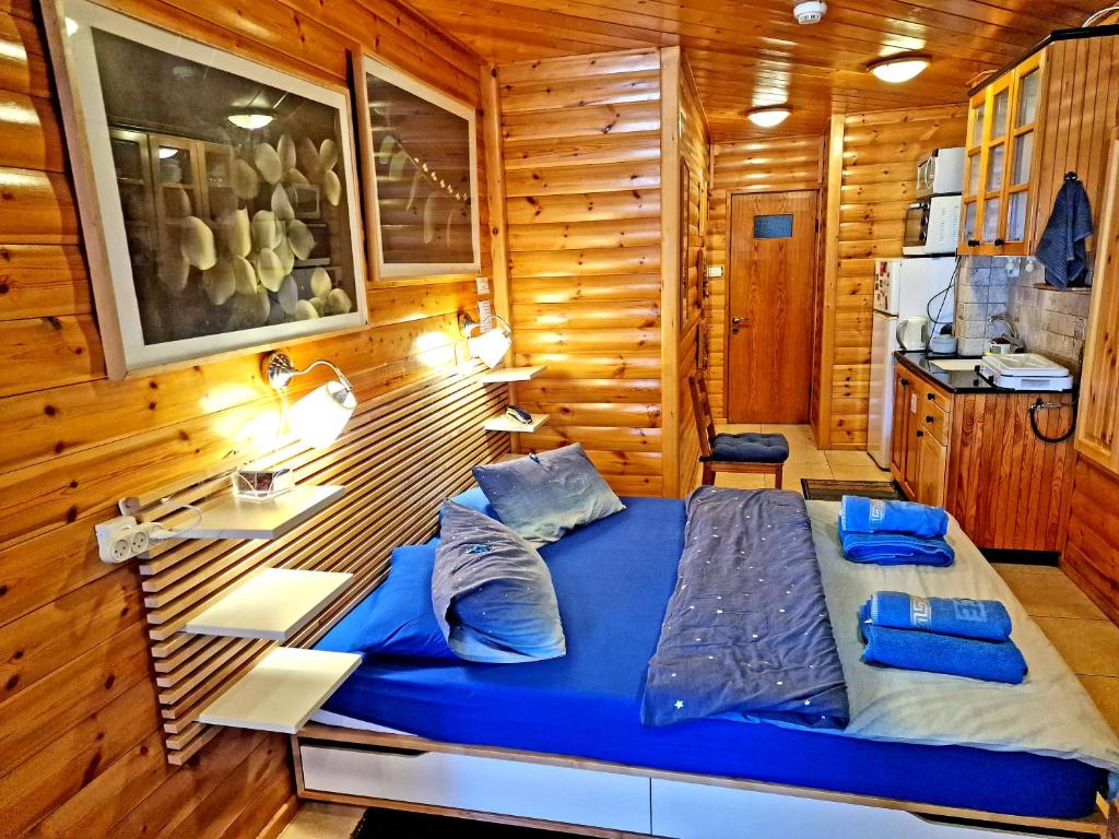 Postel nebo postele na pokoji v ubytování Ohn-Bar Guesthouse
