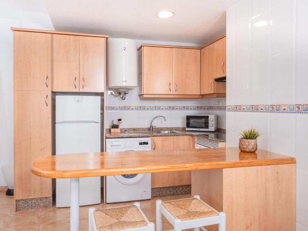 Kuchyňa alebo kuchynka v ubytovaní Apartamentos El Calón Playa