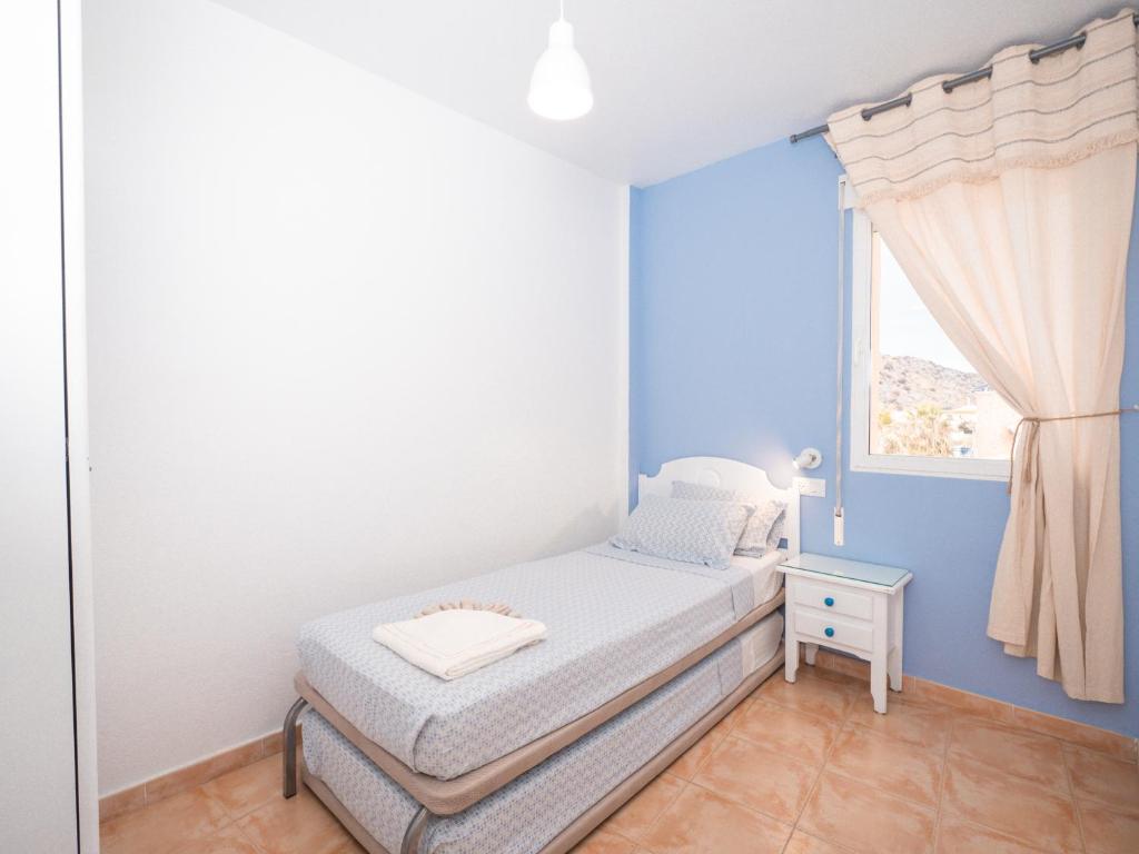 Posteľ alebo postele v izbe v ubytovaní Apartamentos El Calón Playa