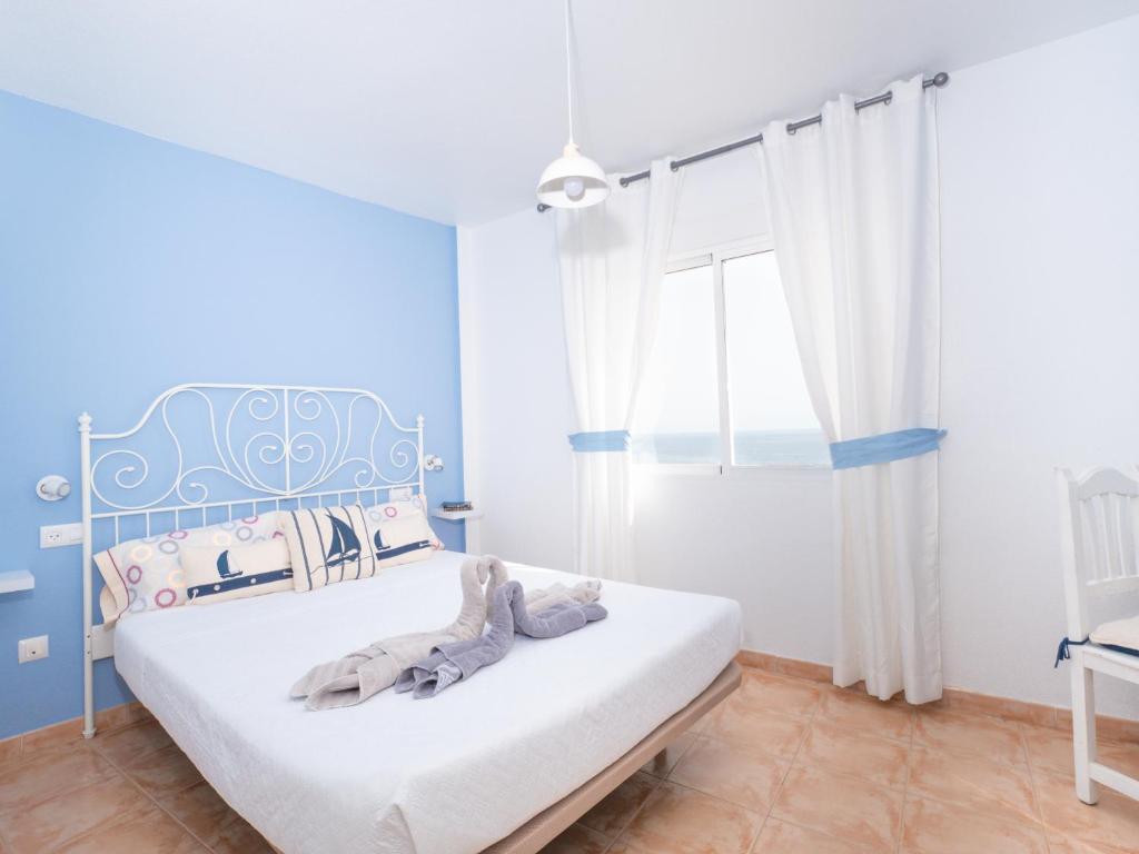 Posteľ alebo postele v izbe v ubytovaní Apartamentos El Calón Playa