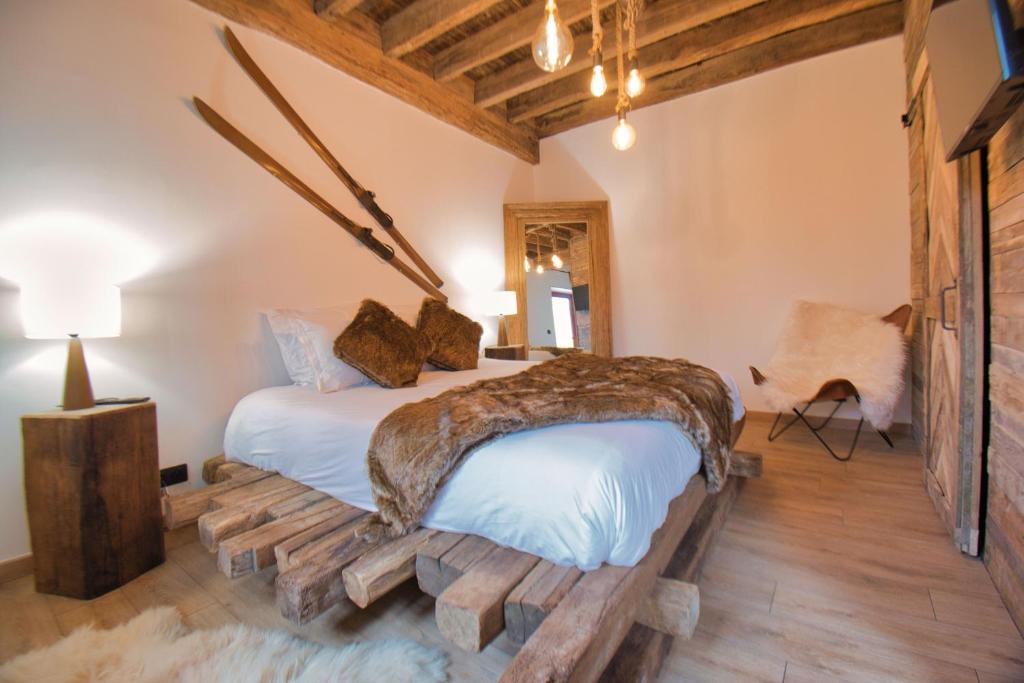 Posteľ alebo postele v izbe v ubytovaní LE RELAIS DES CALECHES - La Chaleureuse