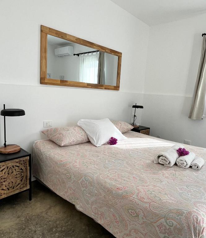 Postel nebo postele na pokoji v ubytování MAYANA SICILY - The suites
