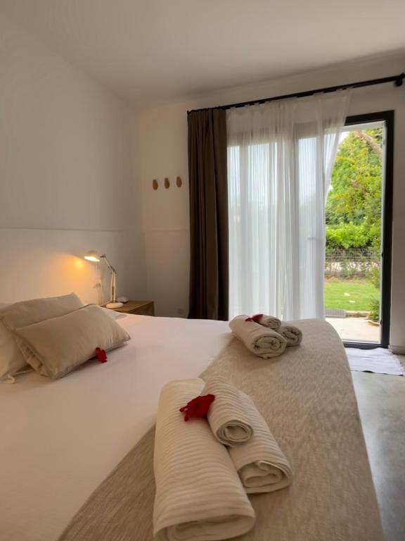 Postel nebo postele na pokoji v ubytování MAYANA SICILY - The suites