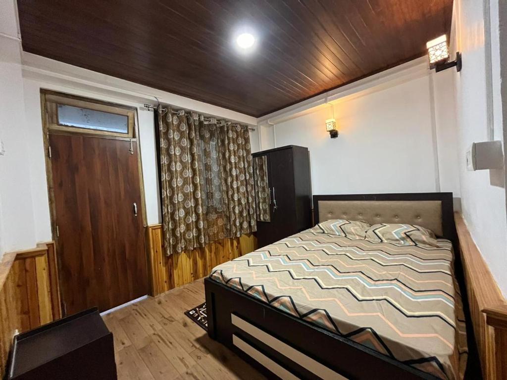Postel nebo postele na pokoji v ubytování Hangkhim Homestay