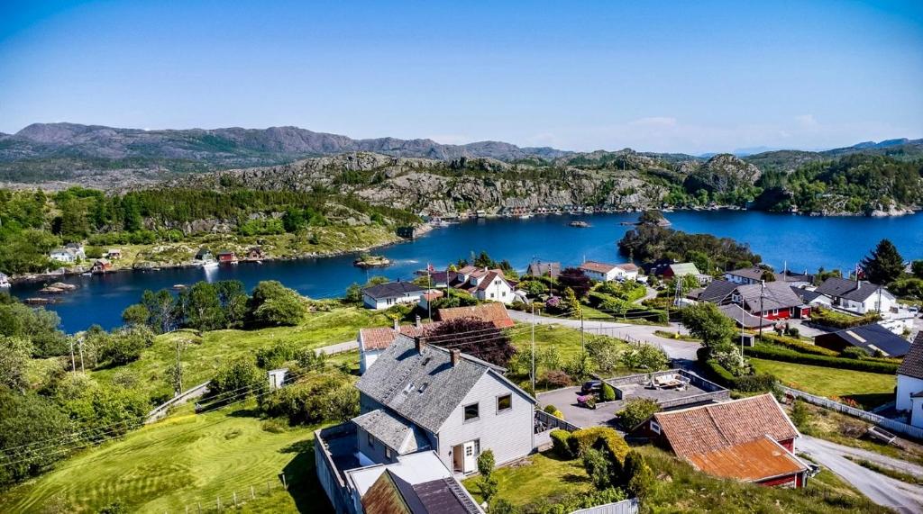 an aerial view of a town with a lake at Fjord-View Apartment in Nese