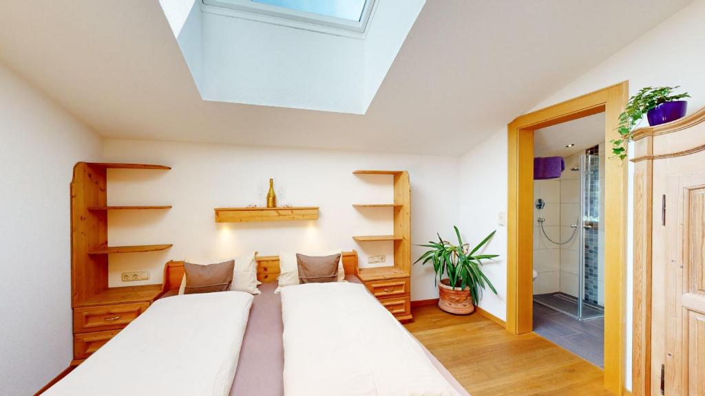 Postel nebo postele na pokoji v ubytování Appartements Hofer